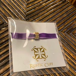 RC purple velvet bracelet with gold emblem